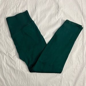 Size small leggings with built in pocket on the back in perfect condition